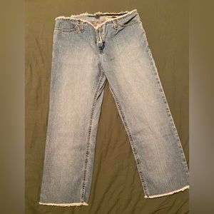 Low waist light wash raw edge jeans